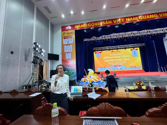 A woman delivering a presentation.