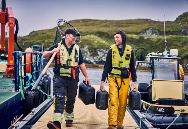 Fish farmers on the pier.