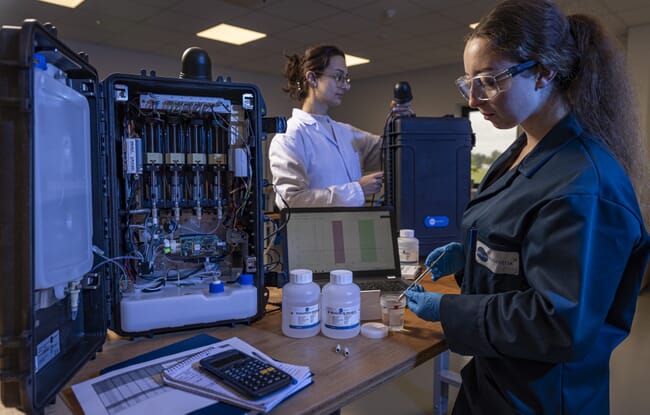 Two people at work in a lab.