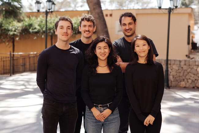 A group of people taking a photo together.