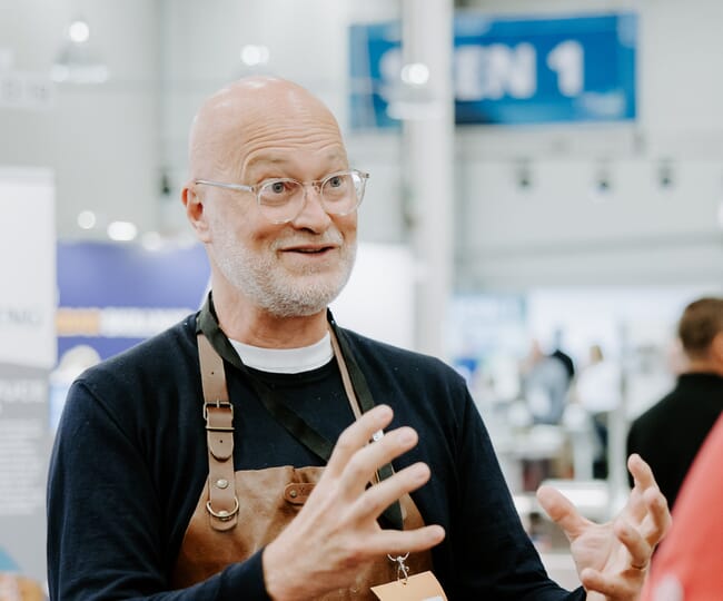 A man explaining a point.