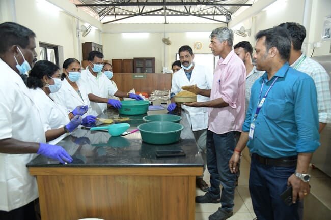 People gathered around a table learning.