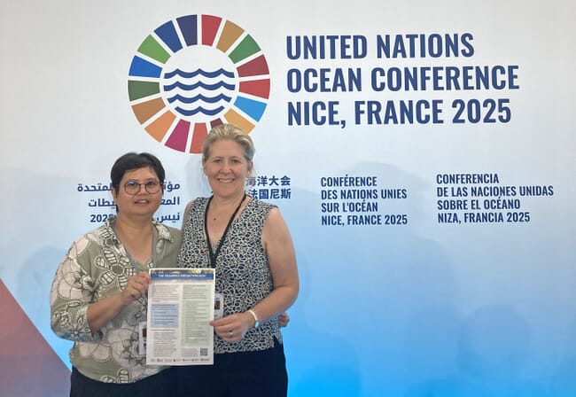Two women at an ocean conference.