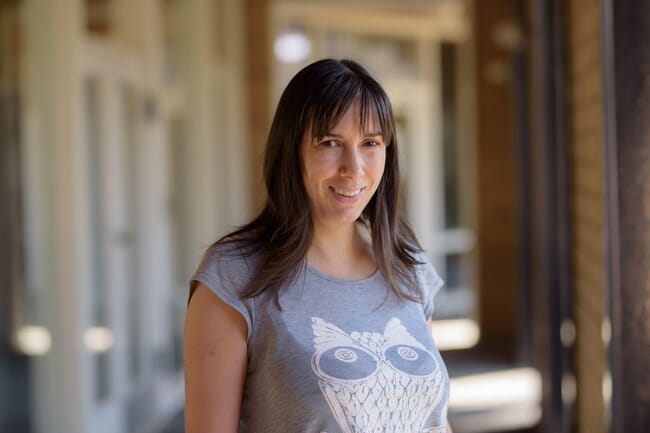 A picture of a woman in a t-shirt.
