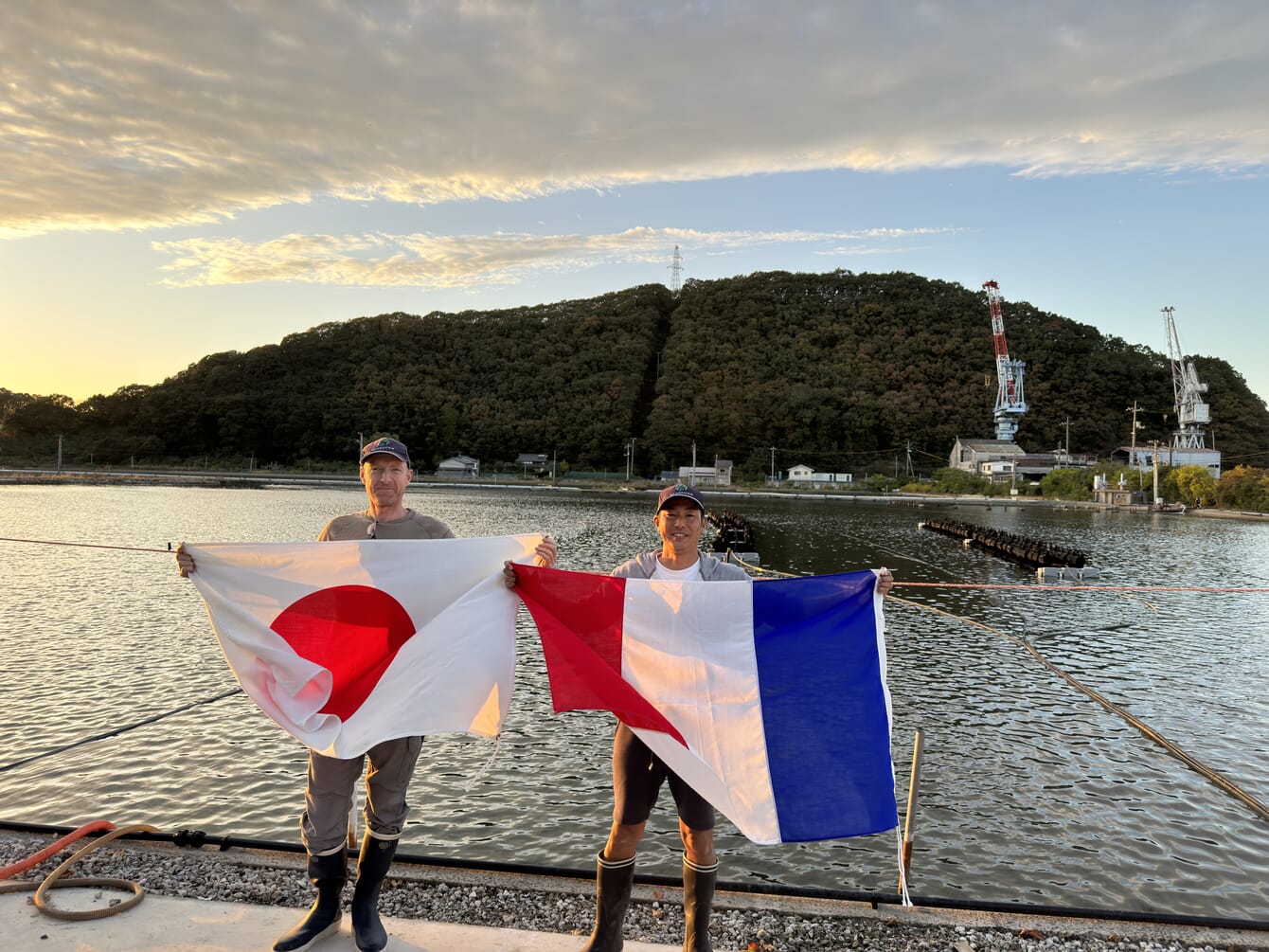 Two men holding flags.