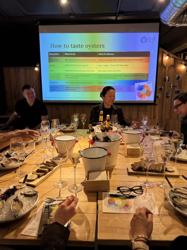 Participants at an oyster tasting event.