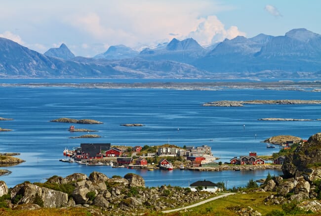 An aerial view of a town in Norway on a sunny day.