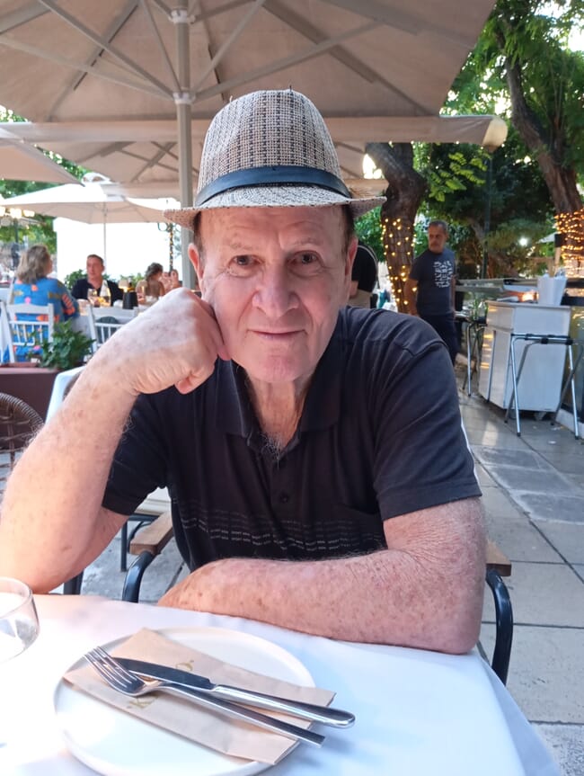 A man sitting at a restaurant table
