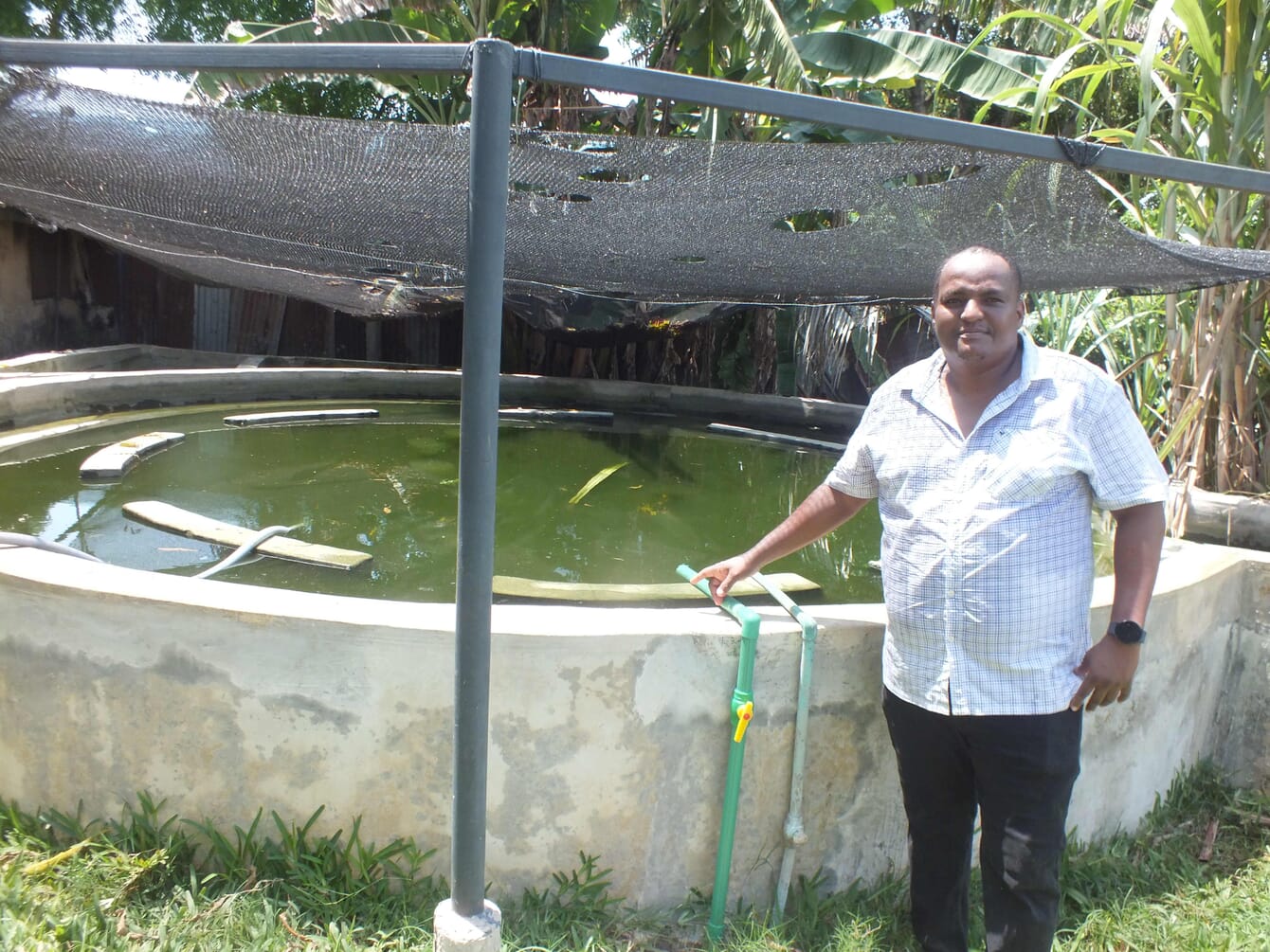 Paul Murage at his fish farm in Kenya.