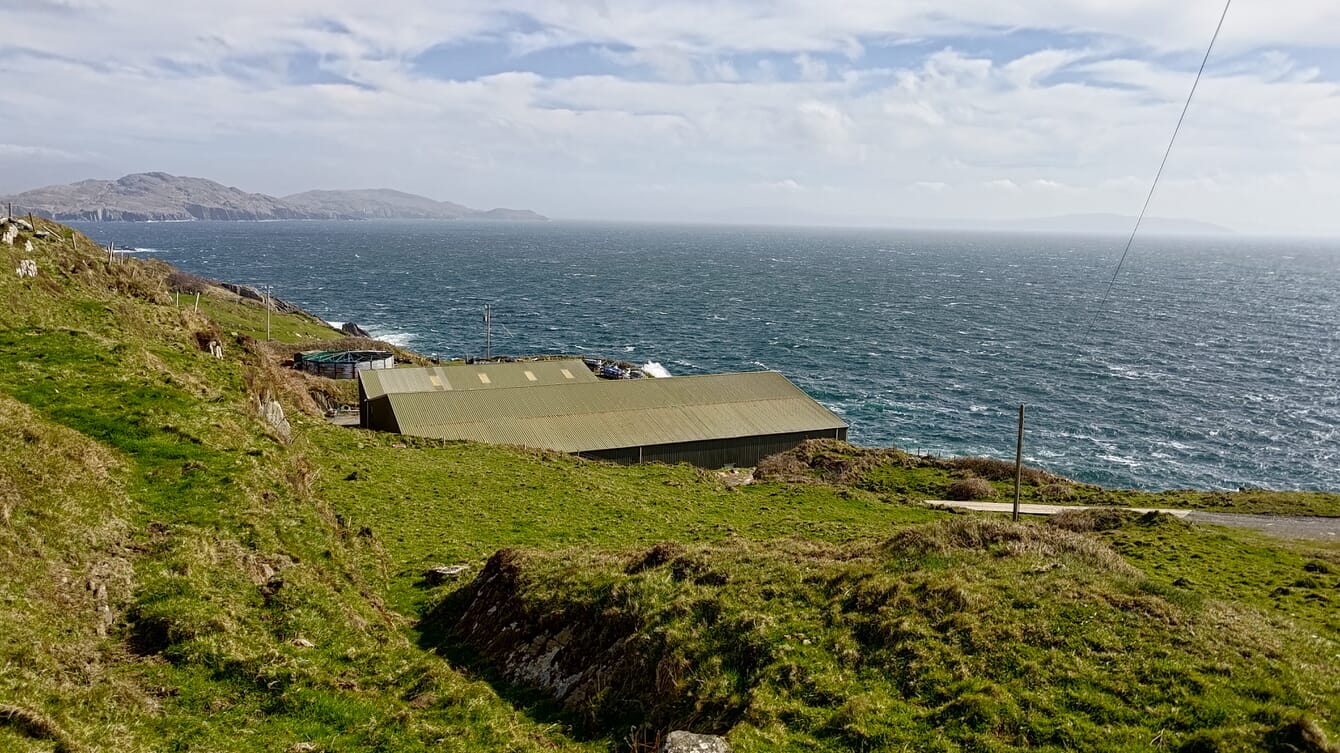 A large building above the sea.