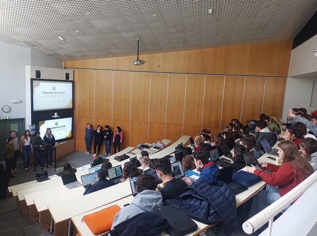 Students in a lecture theatre.