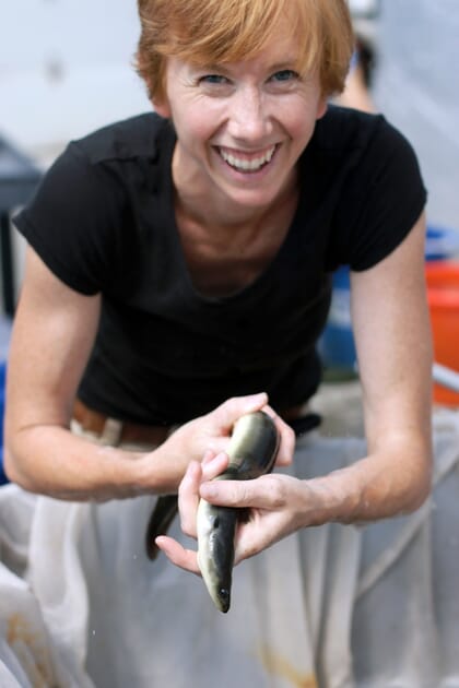 Sara Rademaker holding an eel
