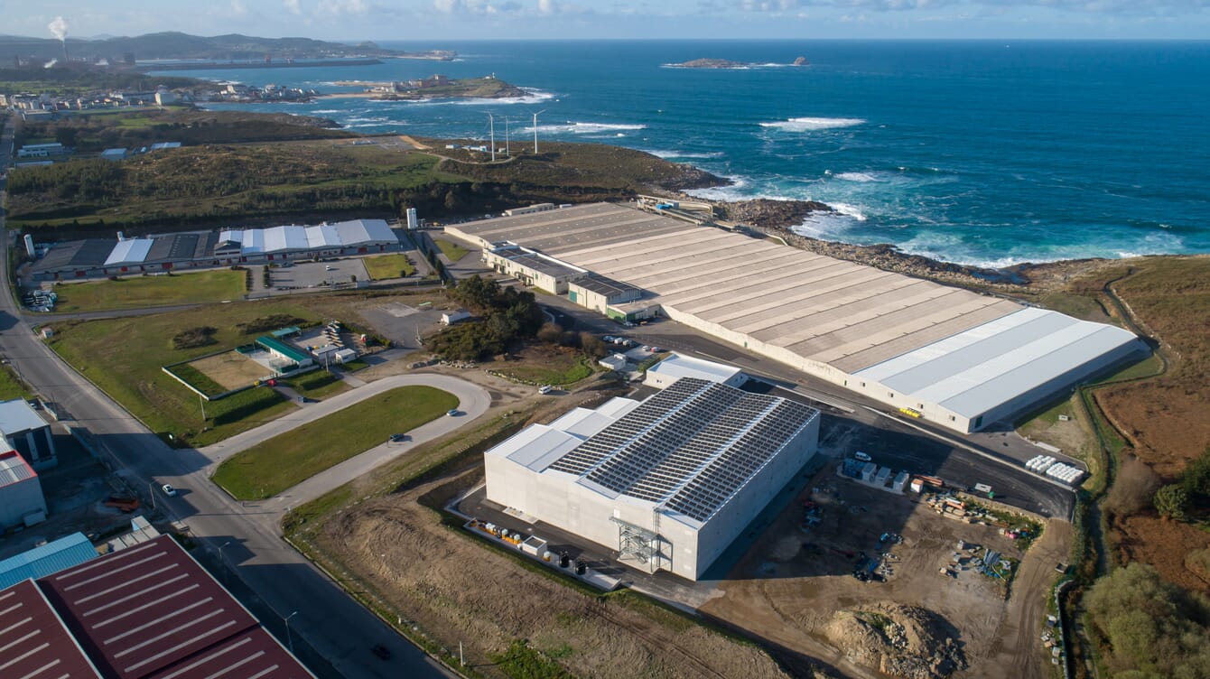 Aerial view of a large indoor fish farm.