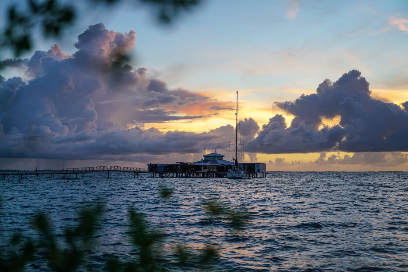 A sunset view of Kamoka pearl farm above water.