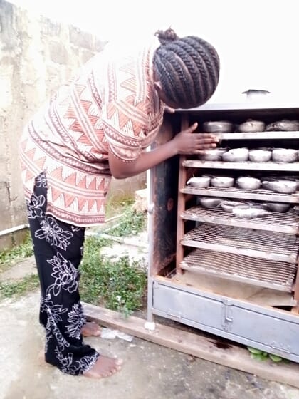 Putting catfish into a smoker