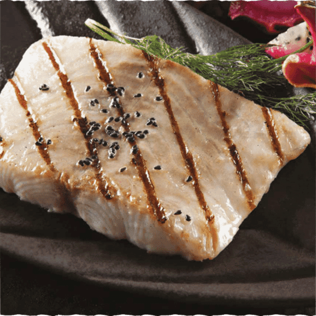 A fish filet in a plate.