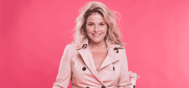 A woman in a pink coat